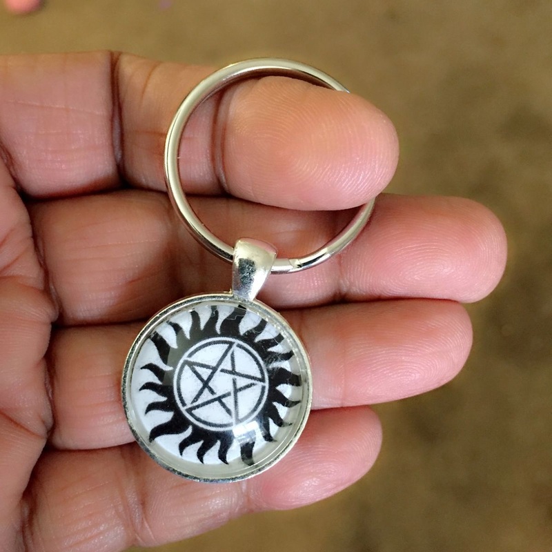 Anti Possesion Tattoo Cabochon Key Ring.